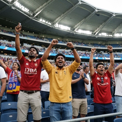 Rugby fans cheering in a stadium in Melbourne
